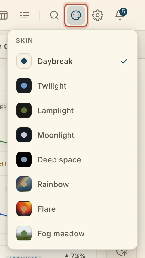 The Skin menu, open from the top bar, listing the skins